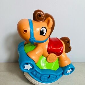 LeapFrog Roll & Go Rocking Horse, an educational electronic toy.